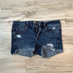 Distressed denim shorts